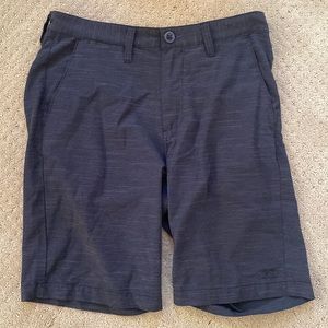 Black hybrid billabong shorts.